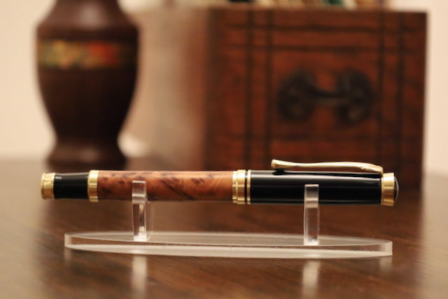 Luxury pen on a stand with a blurred background