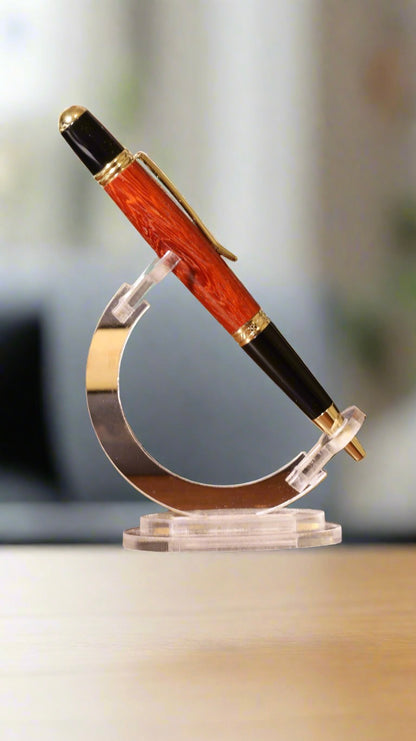 Pen with a unique design resembling a micrometer on a blurred background