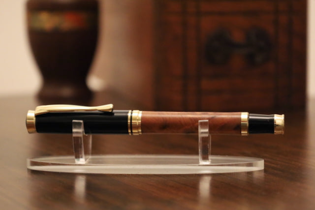 Luxury pen on a stand with a blurred background