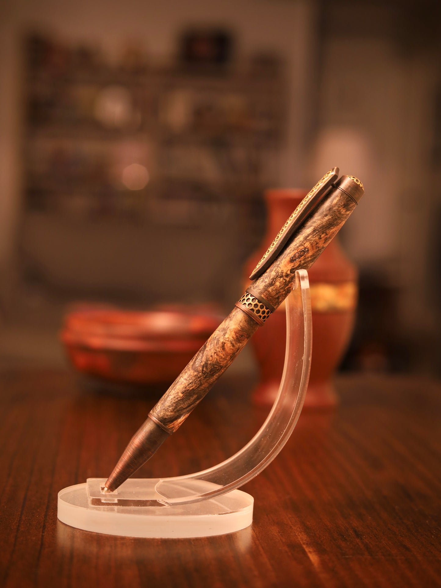 Decorative pen on a stand with a blurred background