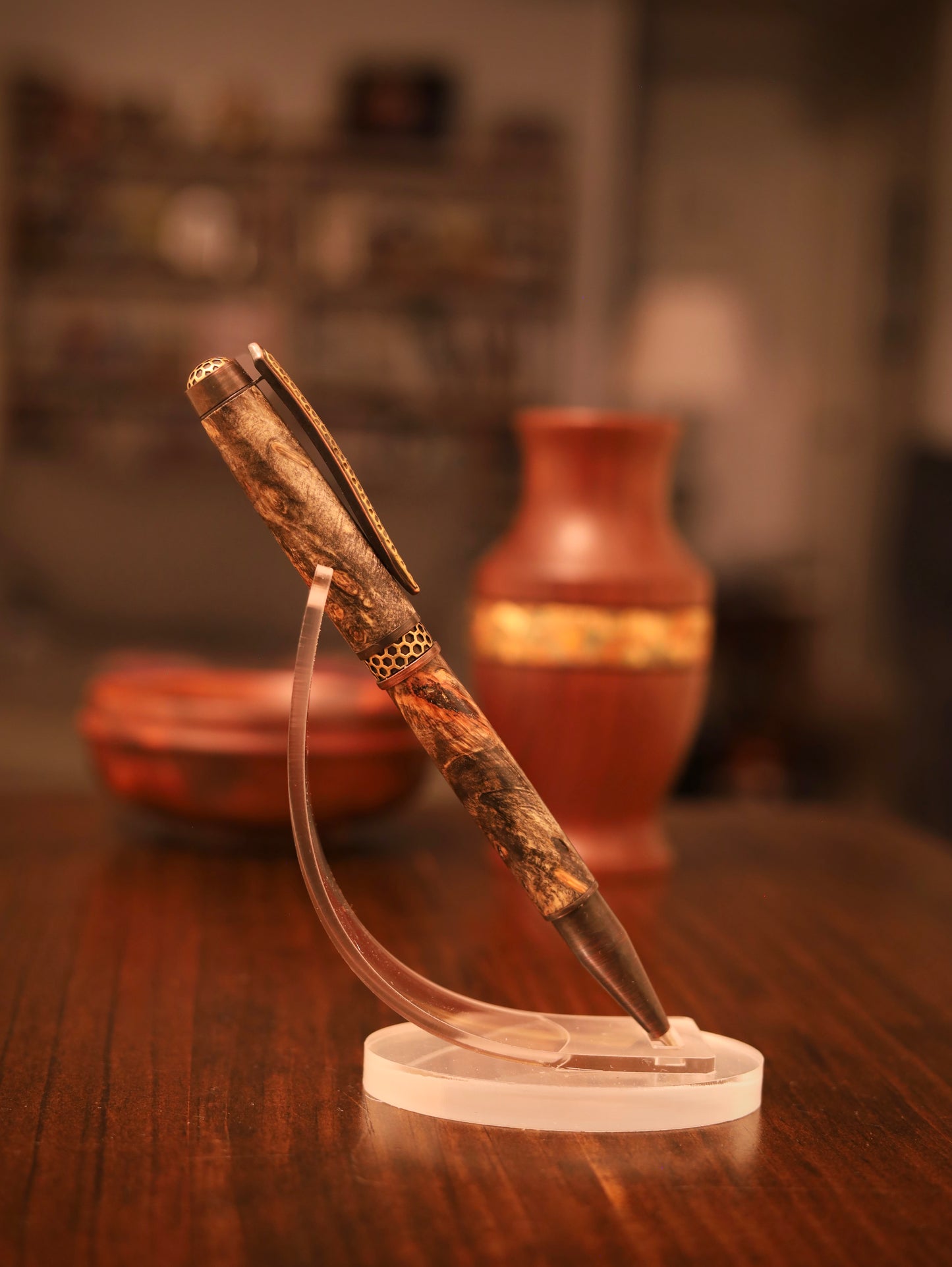 Decorative pen on a stand with a blurred background