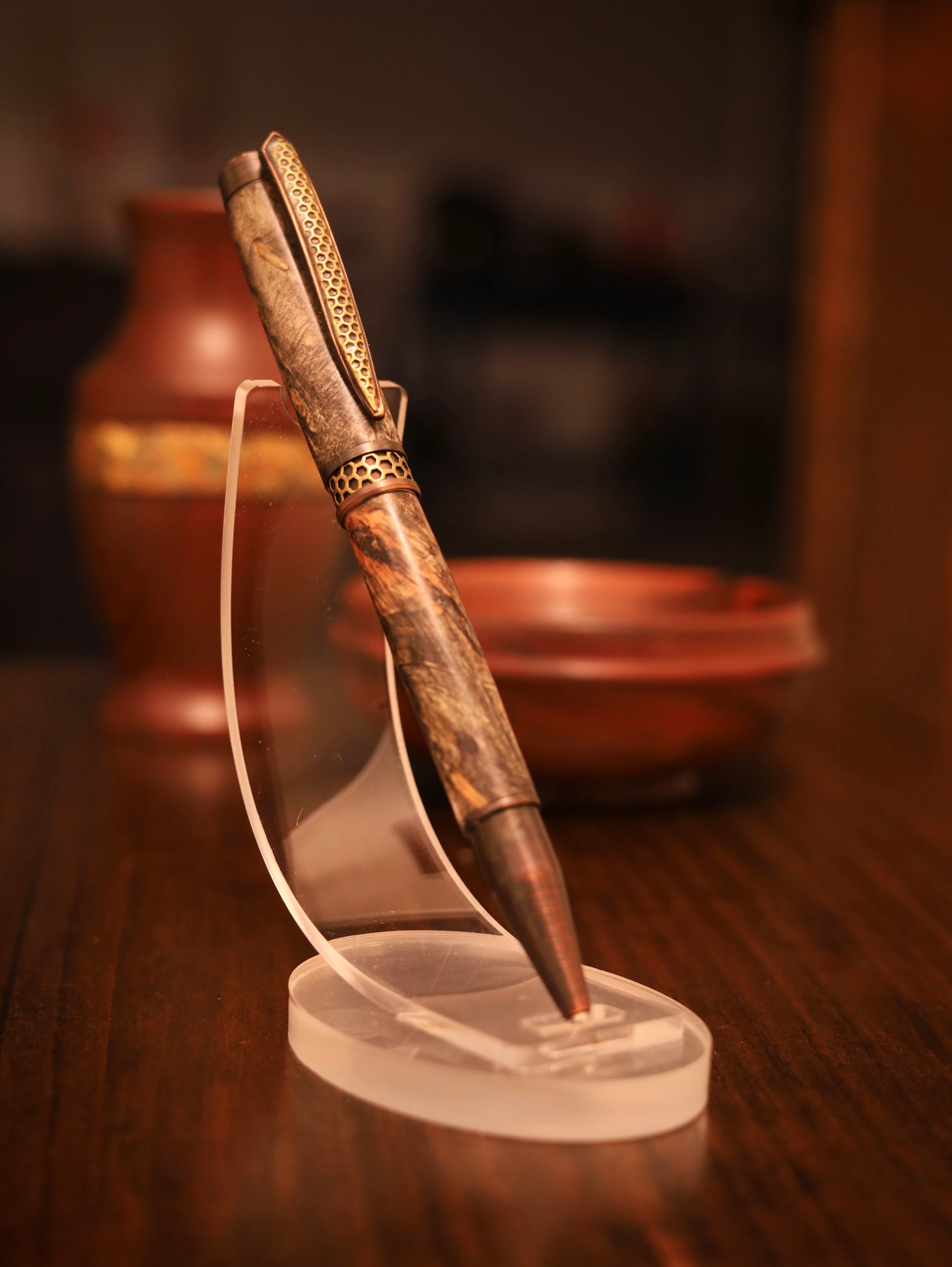 Decorative pen on a stand with a blurred background