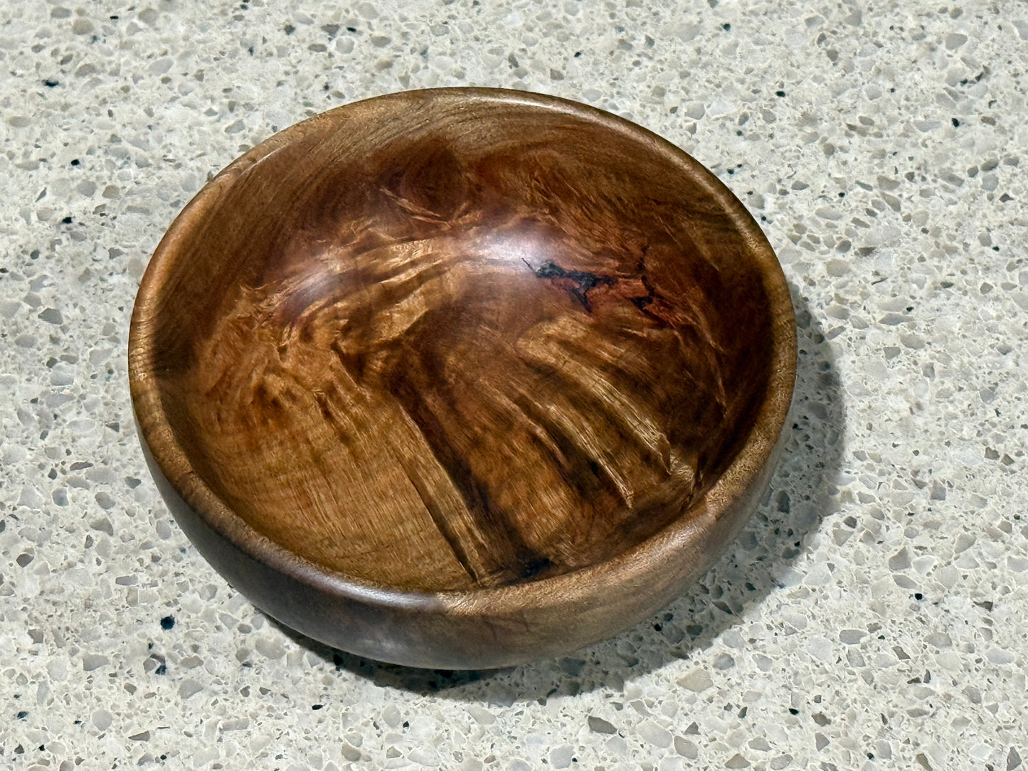 Wooden bowl on a kitchen counter
