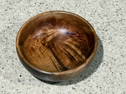 Wooden bowl on a kitchen counter
