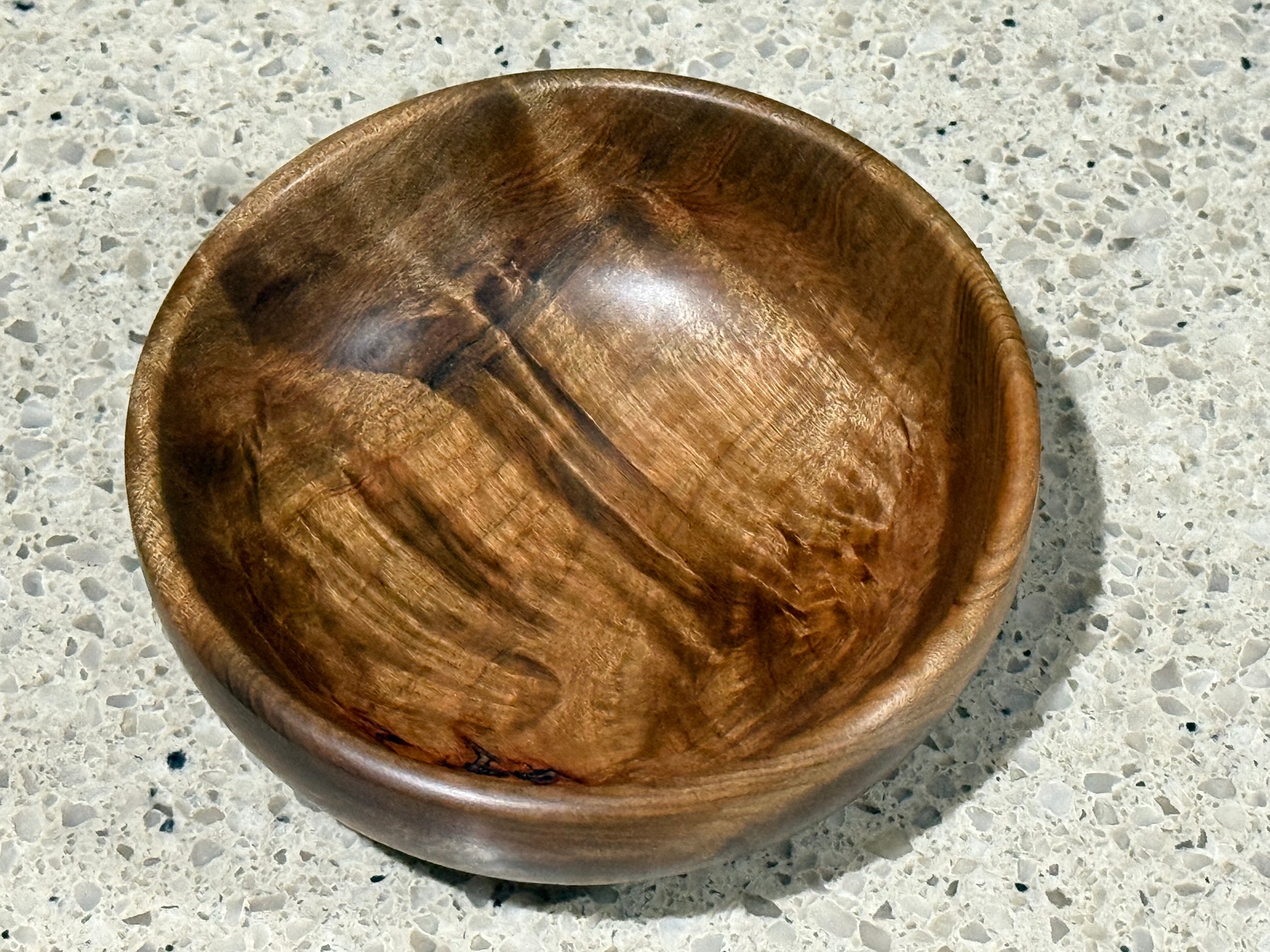 Wooden bowl on a kitchen counter