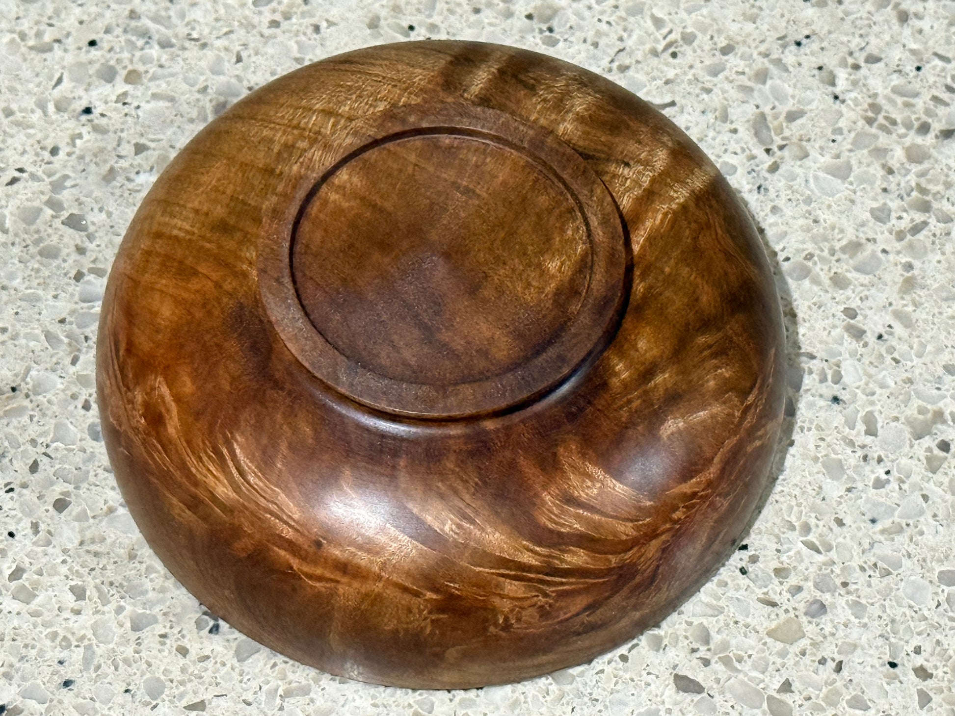 Wooden bowl on a kitchen counter